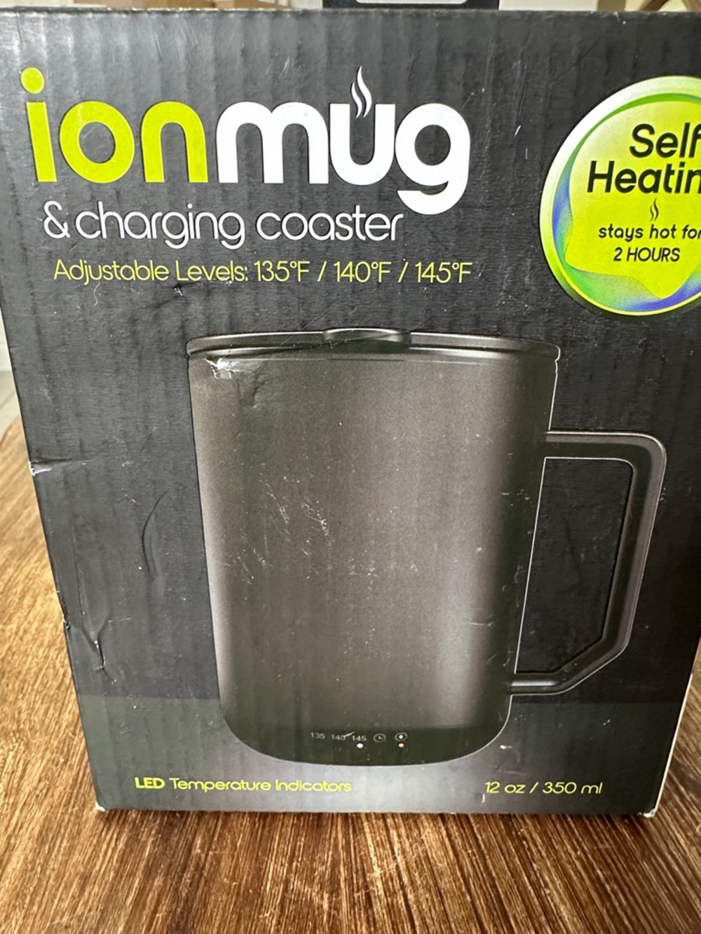 ionmug Self-Heating Black Travel Mug with Charging Coaster